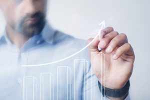 Man Giving A Business Presentation Using A High Technology Digit