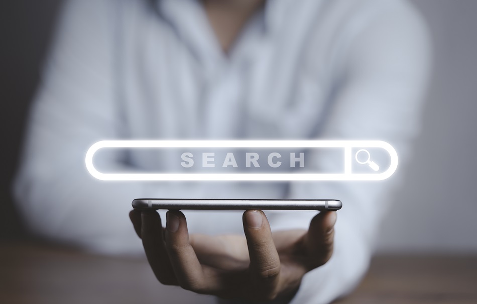 Businessman Holding Smartphone With Virtual Search Engine Browse