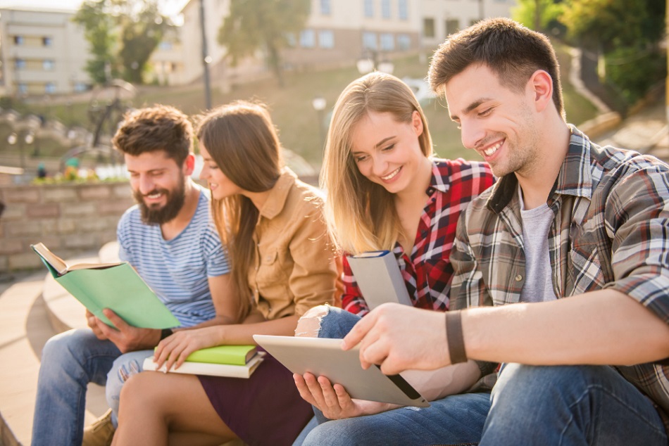 Two Beautiful Couples Read Books Spend Time Together
